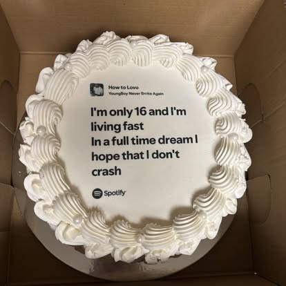 Round cake topped with an edible printed card