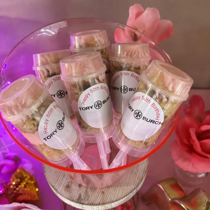 Cake push pops tied with ribbon