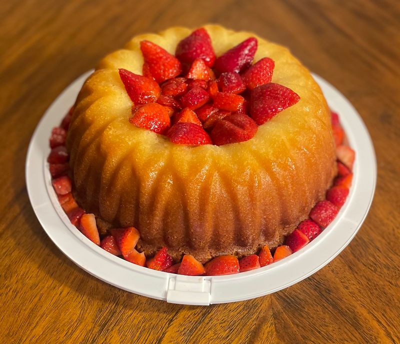 Glazed pound cake crowned with fresh strawberries